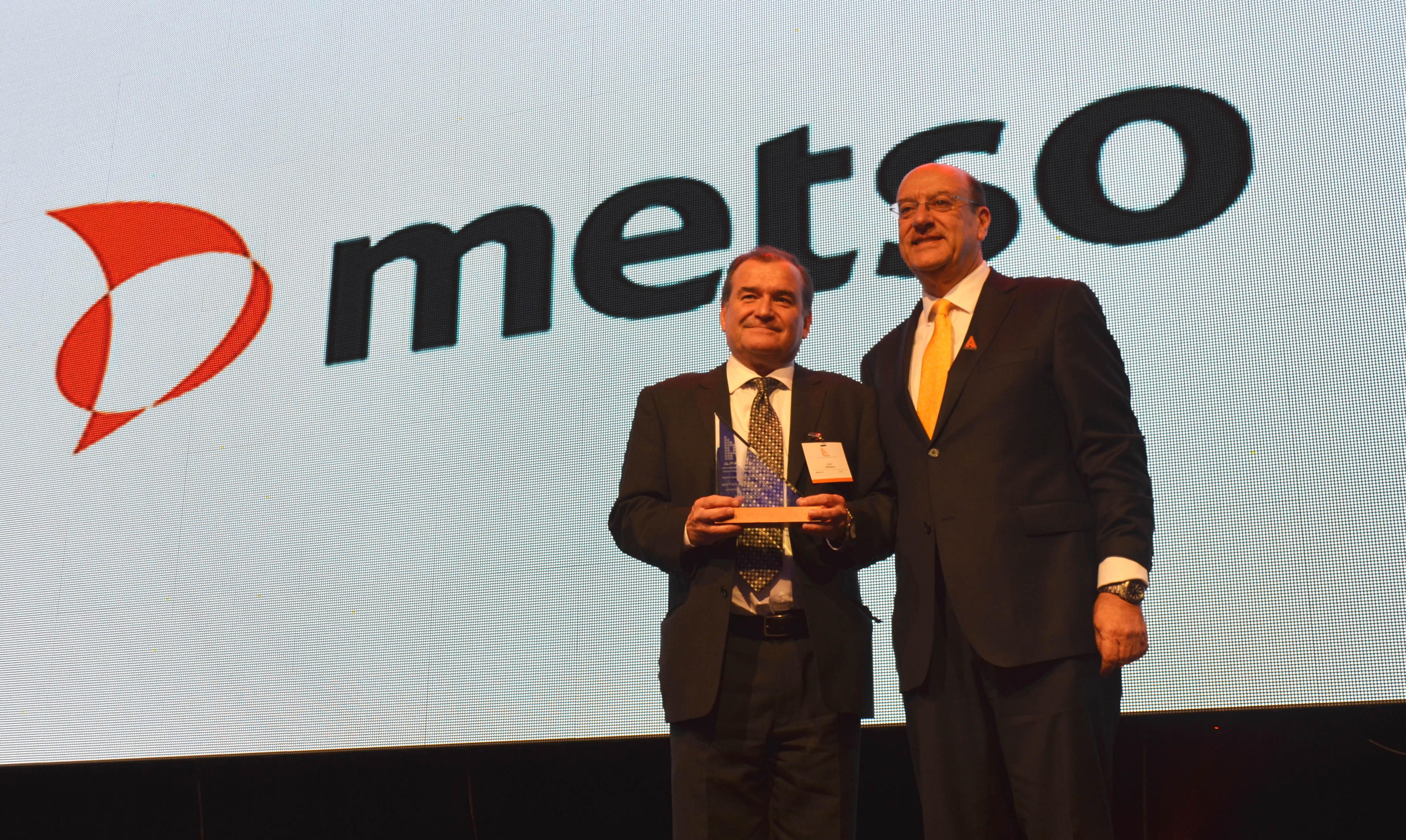 Aldo Cermenati, left, receiving the Annual Safety Award METSO