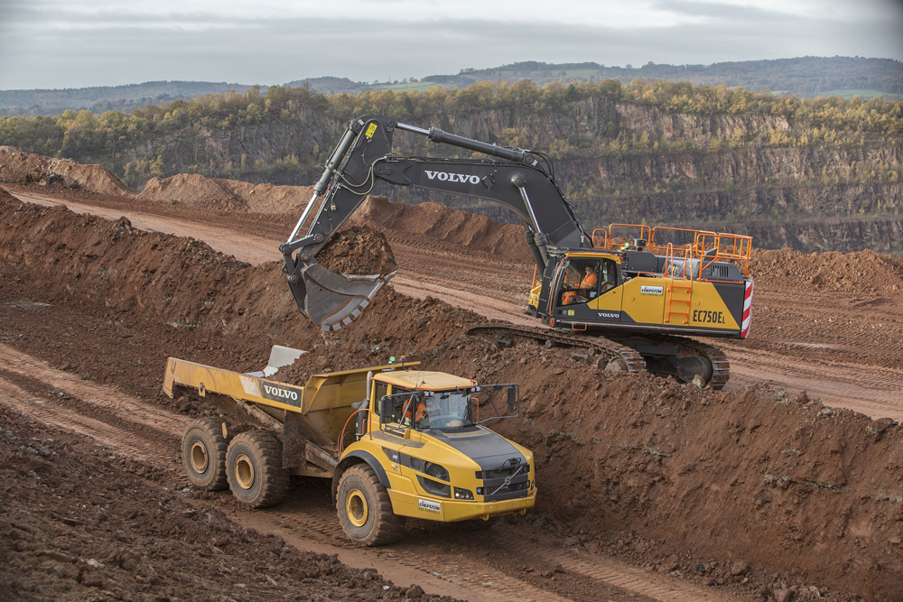 A Chepstow Plant International Volvo EC750E excavator and Volvo A40G articulated haul truck carrying out quarrying work