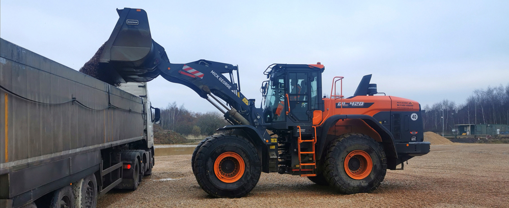 The Mick George Group has received Britain's first new Doosan DL-7 wheeled loaders. Pictured is one of the company’s DL420-7 models