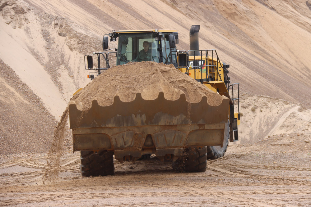 A Cat 988K XE large wheeled loader working at a quarry in Germany