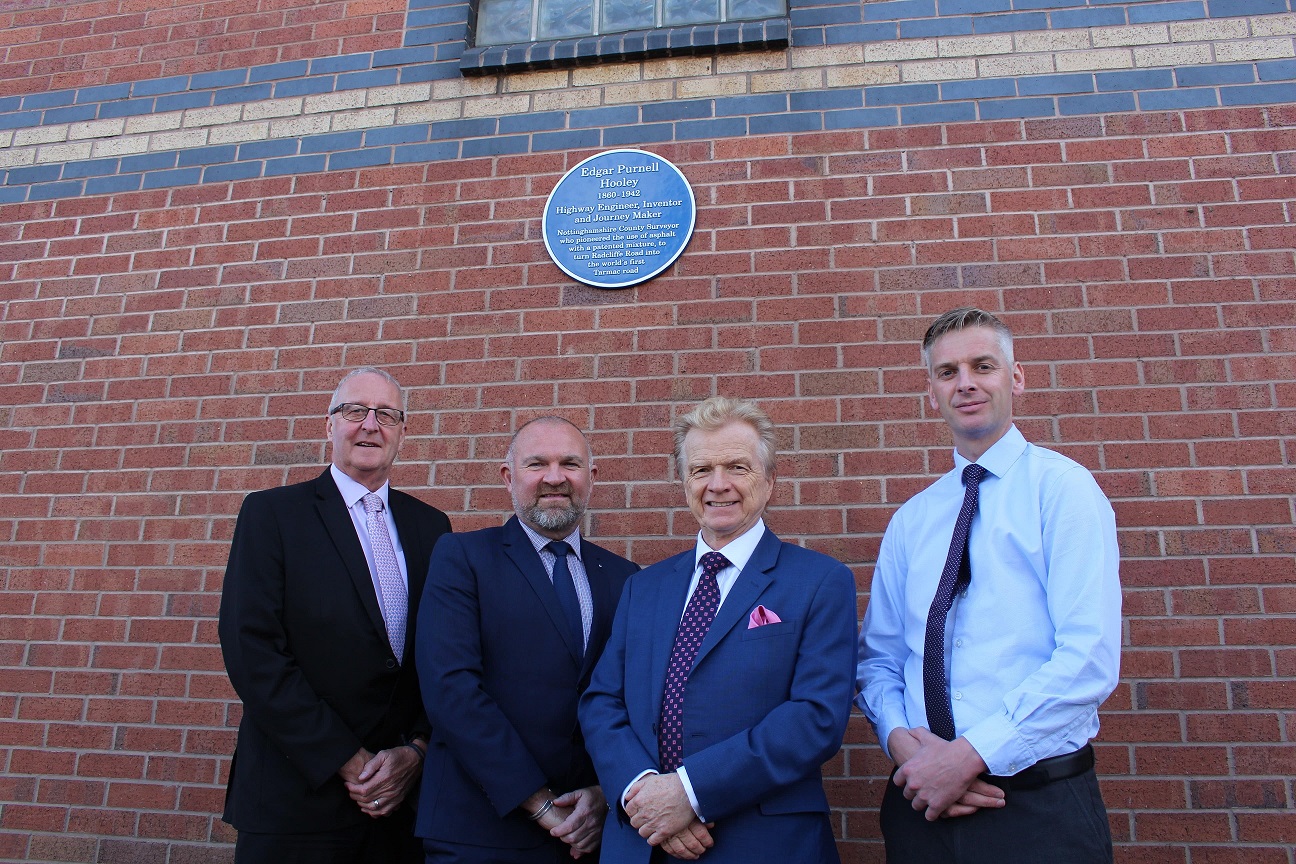 Representatives from Tarmac and Nottinghamshire County Council at Trent Bridge cricket ground with the blue plaque for Edgar Hooley