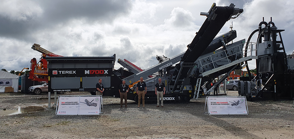 The Terex Washing Systems’ team in front of the M1700X plant launched at the CQMS show in Ireland