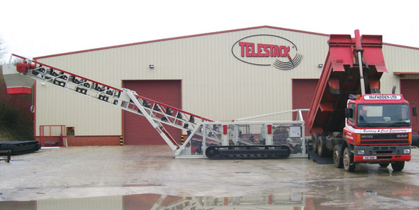 Front of Telestack with truck unloading converyor in front 