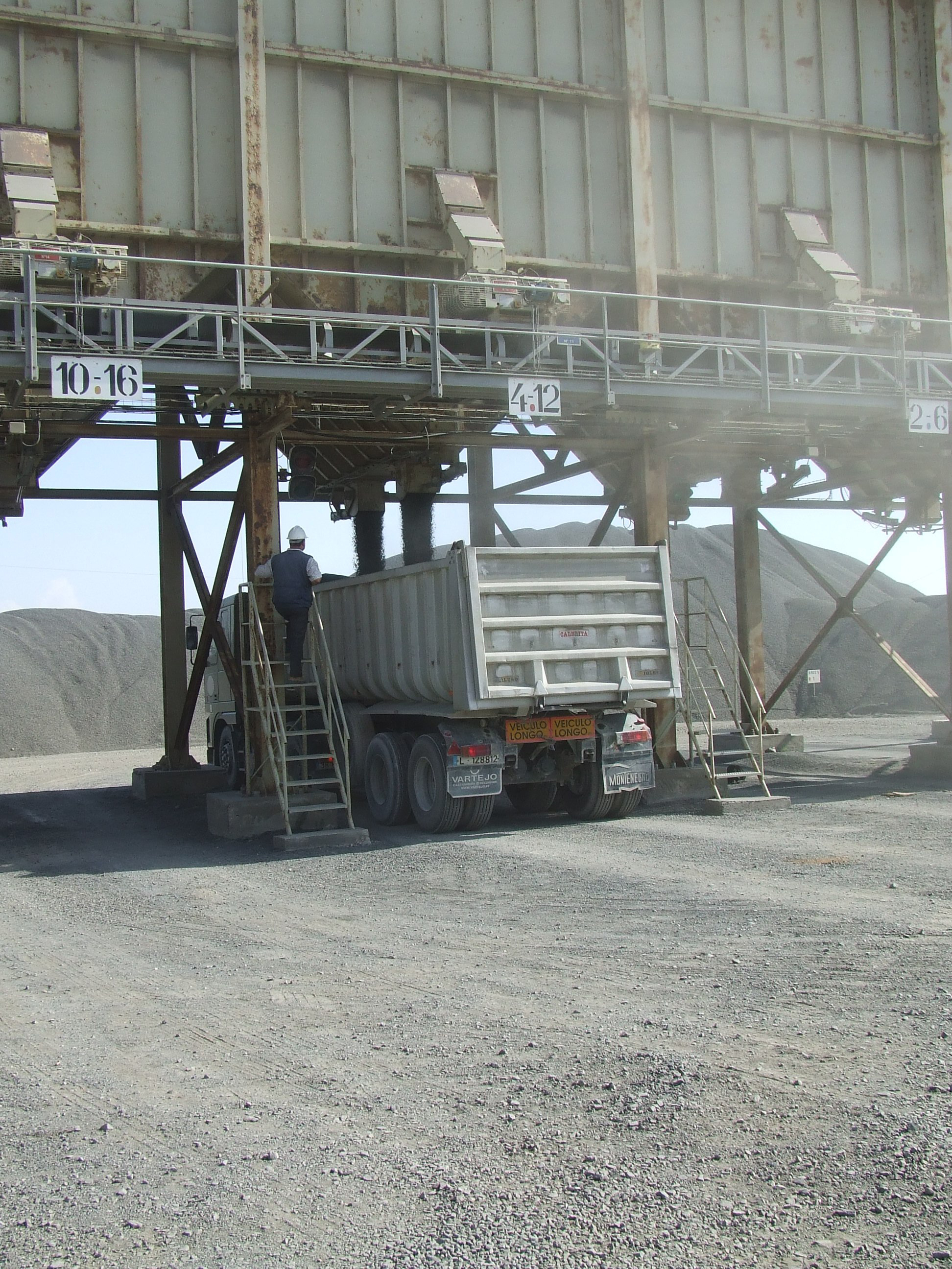 truck being loaded with aggregates