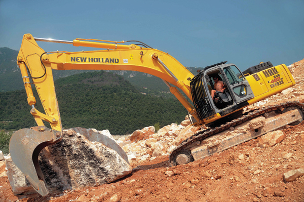 excavator shifting marble on a steep slope