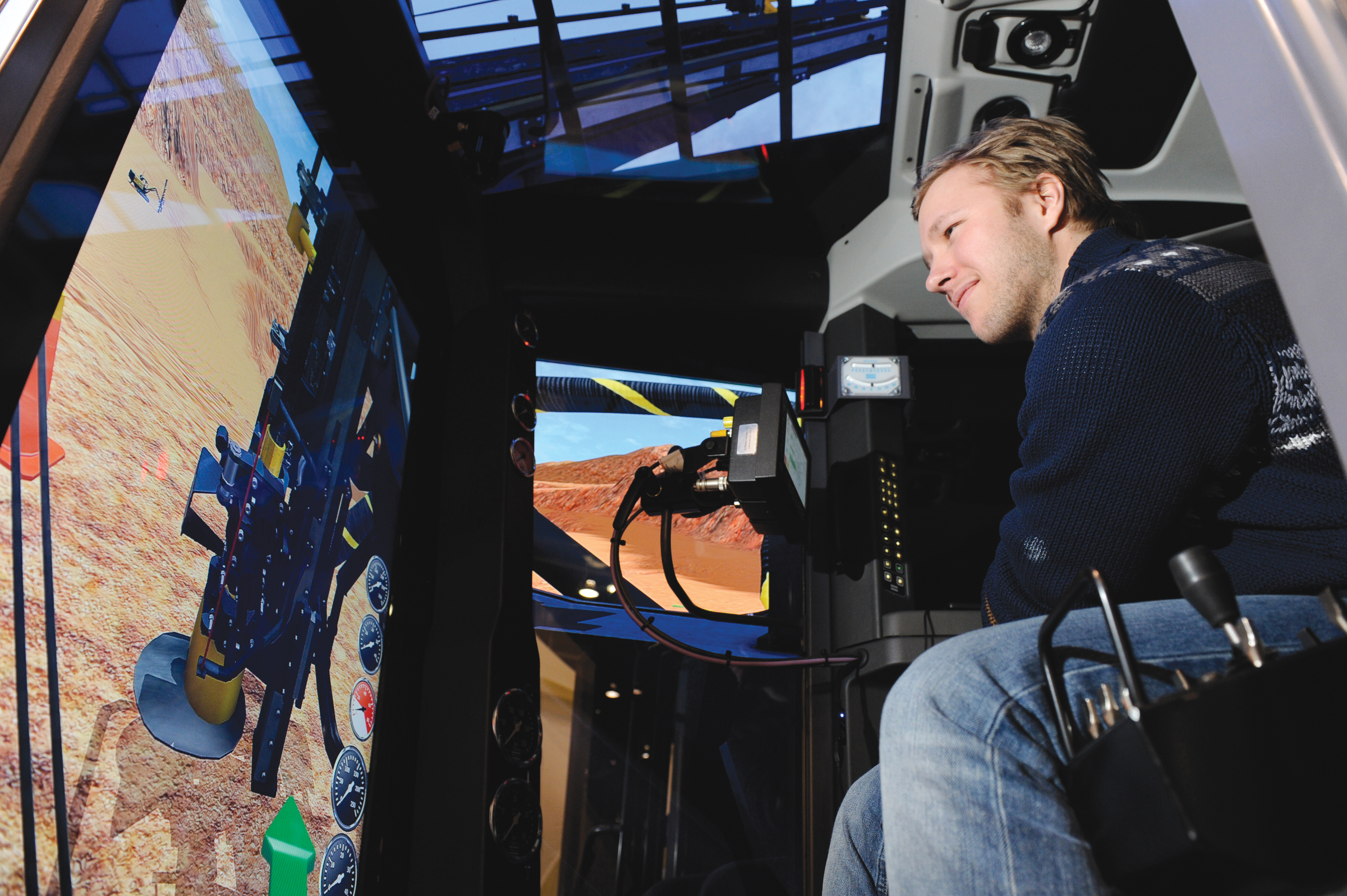 Atlas Copco's Ulf Gyllander demonstrating how to use the simulator