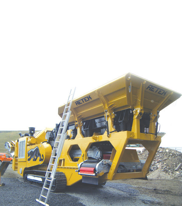 Western Reterk with ladder on side of crusher 