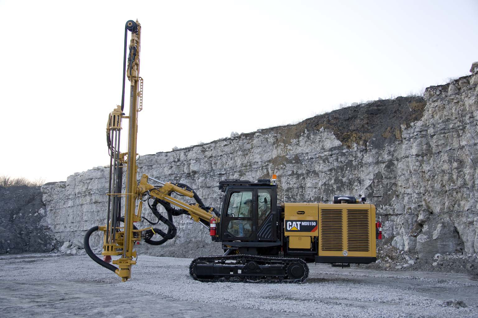 Caterpillar MD5150 track drill in quarry