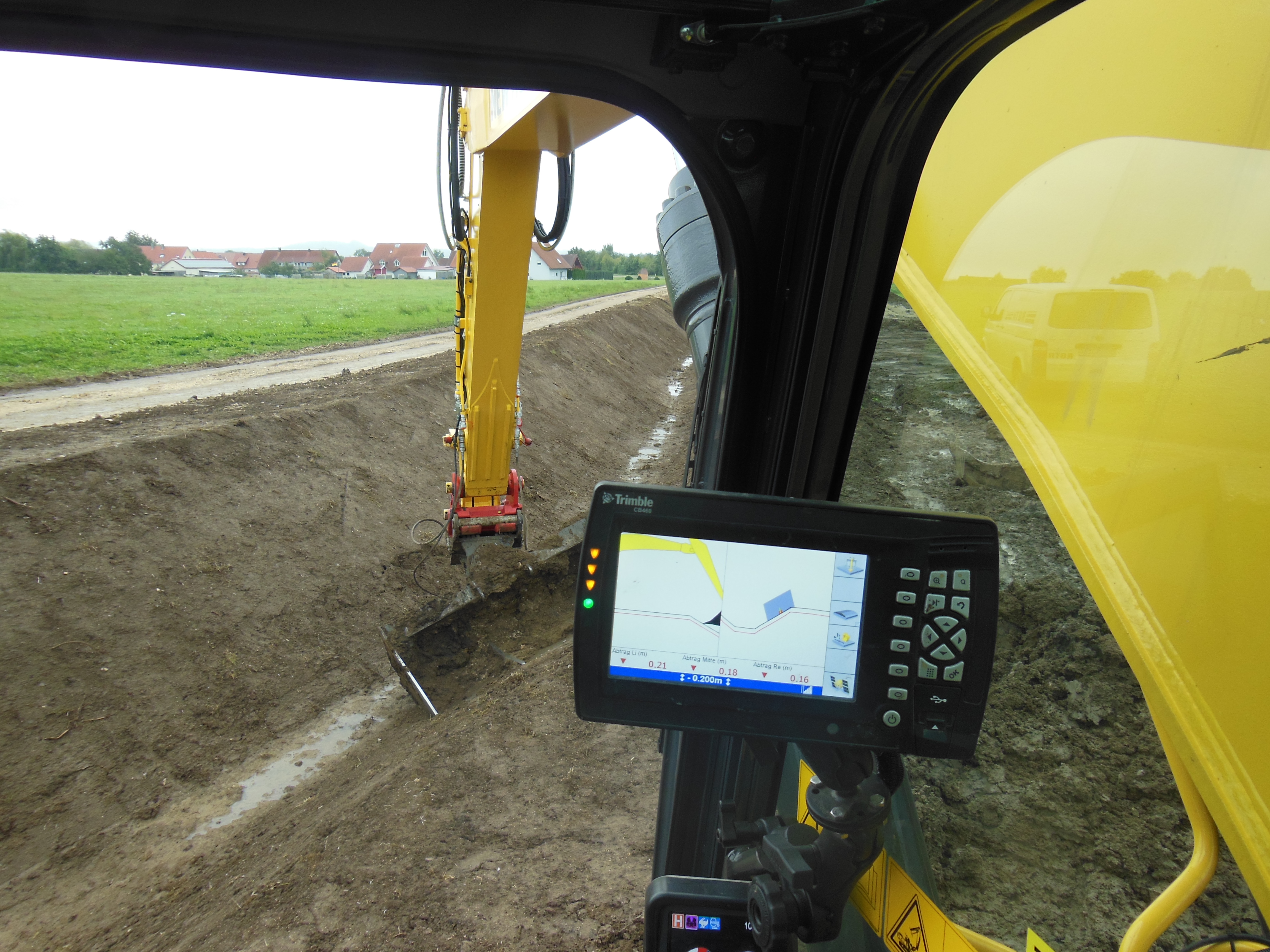New Holland E385C excavator with a Trimble positioning system