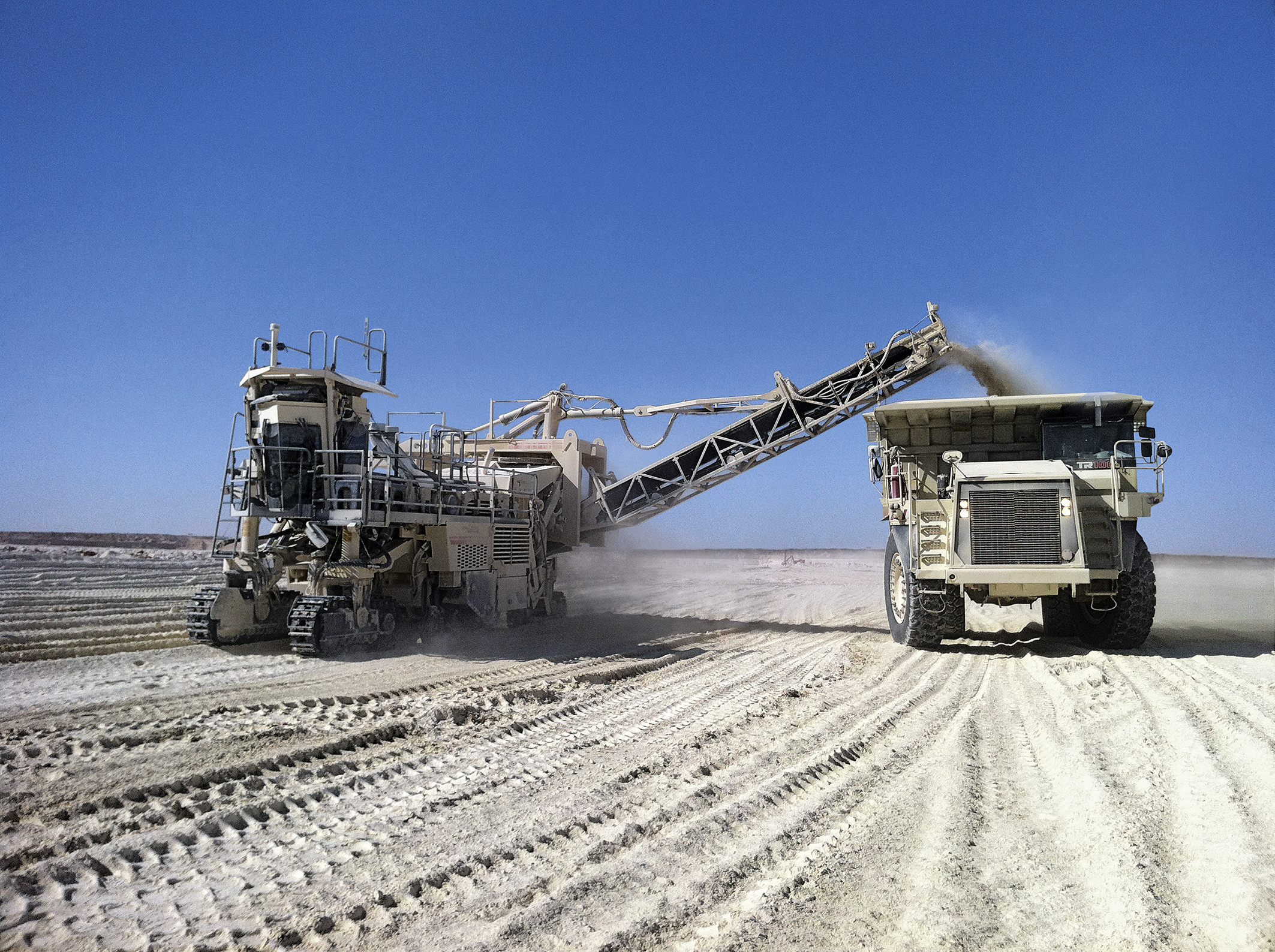 Wirtgen Surface Miner directly loads the cut material on trucks 