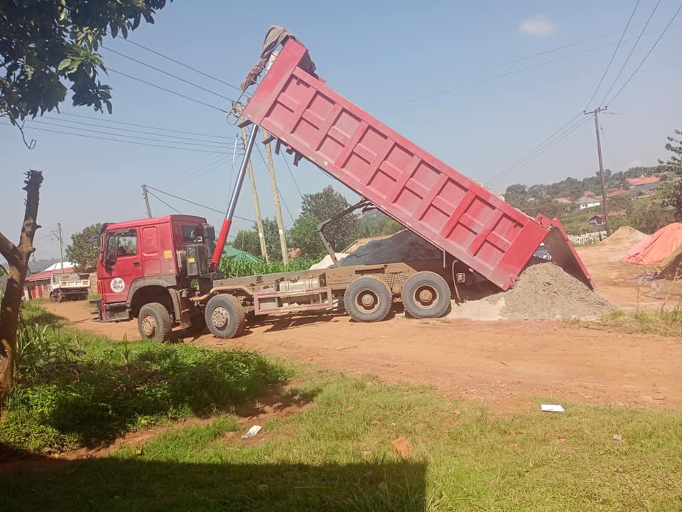 A truck unloading sand in Uganda Pic - Lwera Sand Suppliers