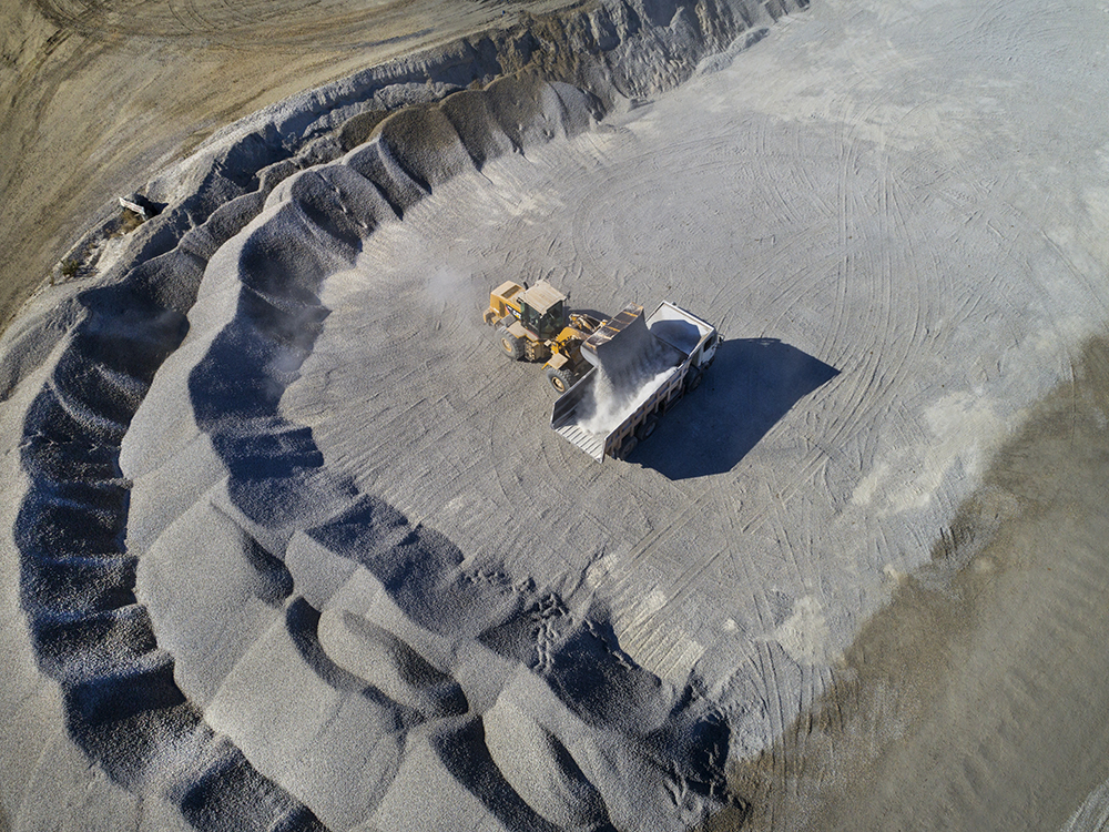 A wheeled loader loading material at Afrimat’s Cape Lime quarry in Cape Town