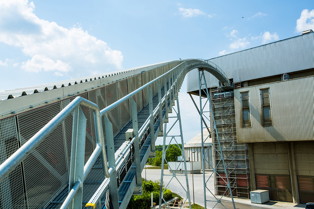 Pipe Conveyor: The enclosed system ensures an environmentally safe, dust-free and low-energy transport of the alternative fuels. Pic: BEUMER Group