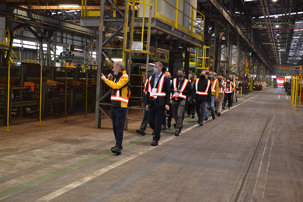 Mario Andaloni, chief operations officer at Berco, leads visitors around the plant: new machinery, revamped workstations and more free space in which to navigate the site