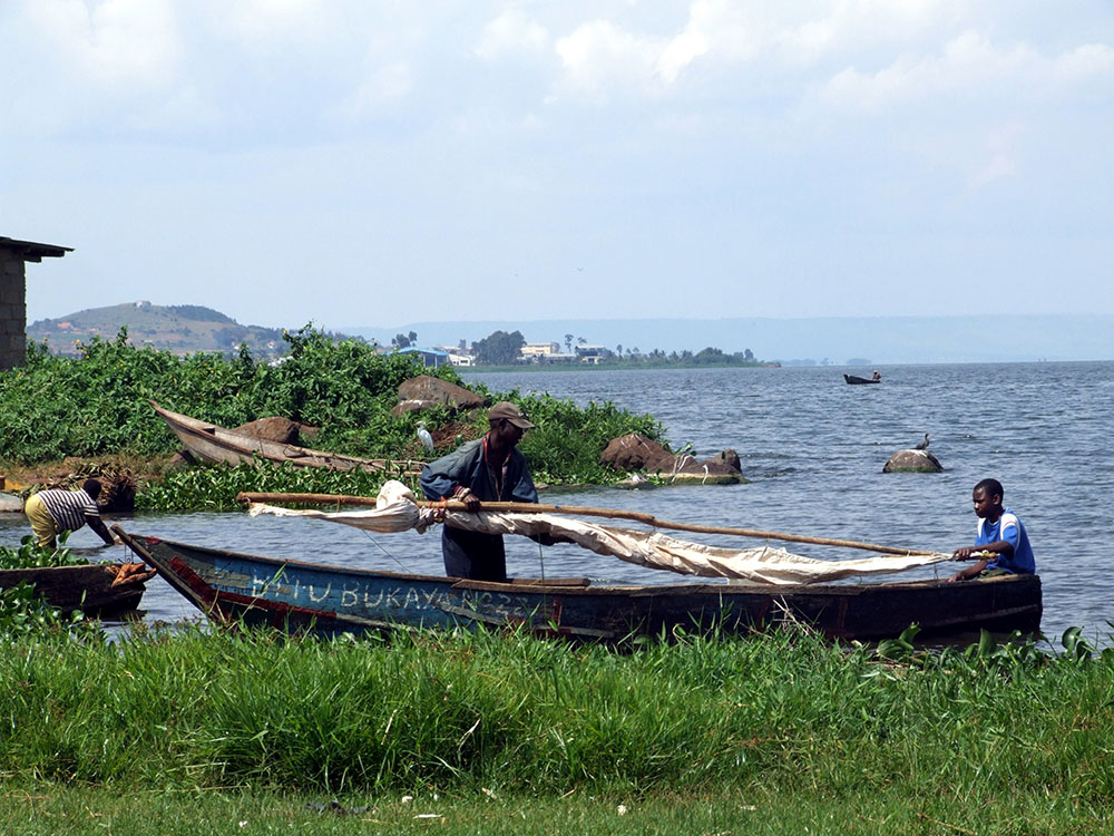Boats at Lake Victoria. The lake is full of alluvial deposits that contain valuable sand for Ugandan construction works
