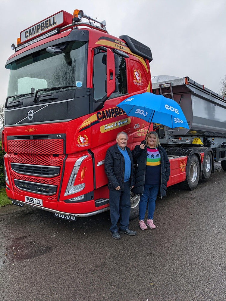 Grainne Quinn with her father Jim Campbell, Campbell Contracts’ founder, in front of a company lorry