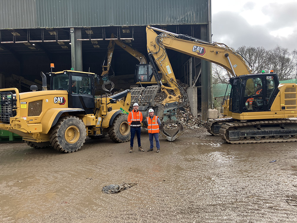 Steve Harman (right), operations director at L&S Waste Management, and Jack Pilgrim, territory account manager for Finning UK & Ireland. Pic: L&S Waste Management-Finning UK& Ireland