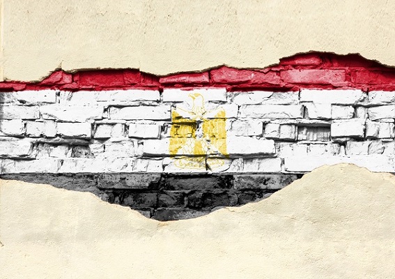 The Egyptian flag on a brick wall