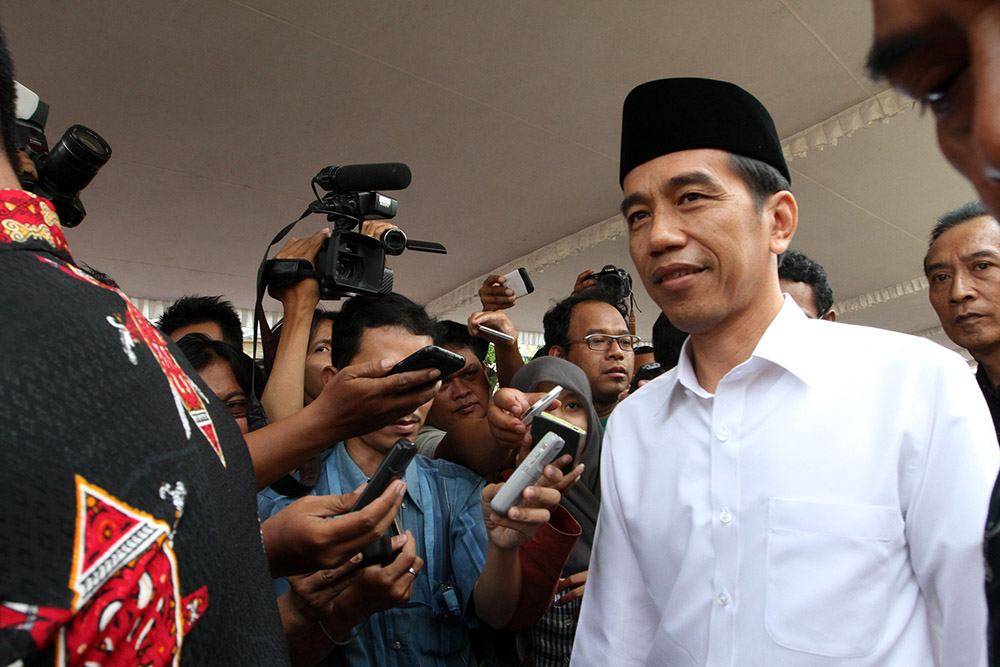 President Joko Widodo answering reporters’ questions in the Indonesian city of Solo
