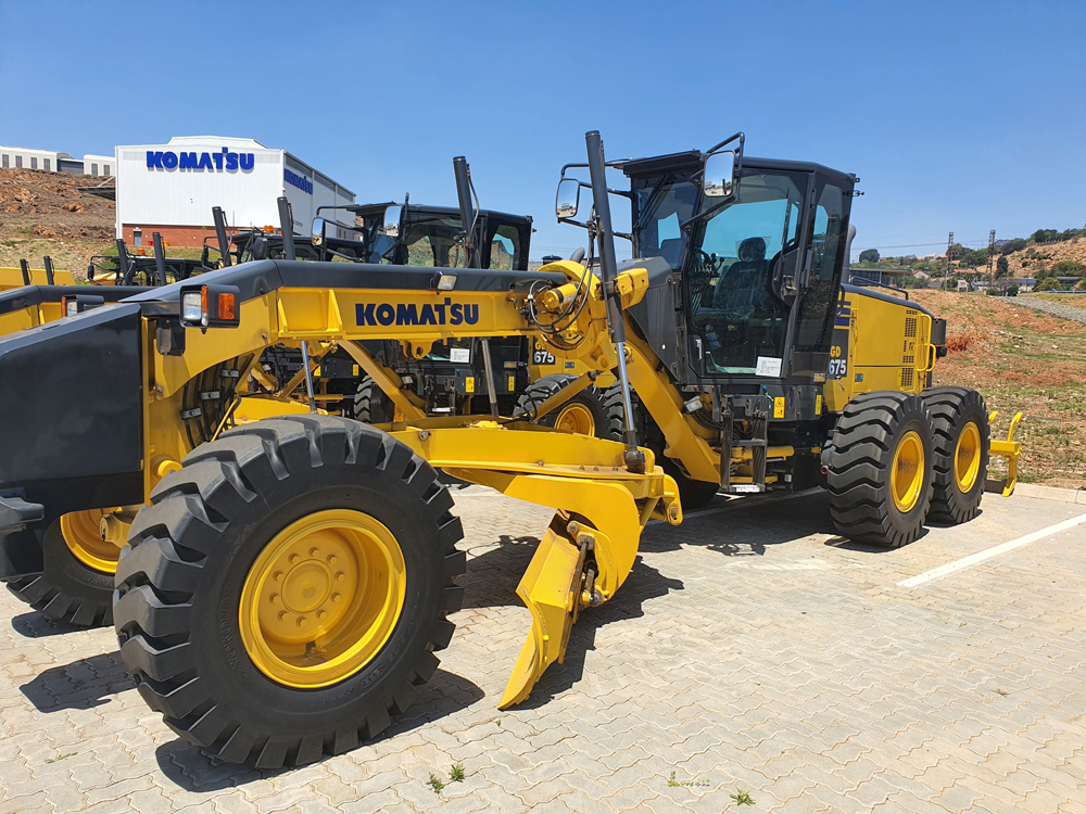 Komatsu’s GD675 mining grader used to clear and maintain loading, dumping and haul surfaces