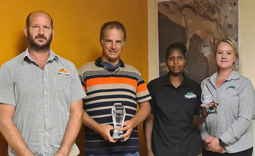 Management showcasing their recent trophies from ASPASA. From left: Derryn Fourie (director); Gary Botha (quarry manager); Laurencia Maphumulo (health and safety award winner); and Bronwyn Moore (general manager) 