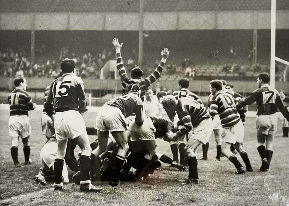 In the thick of it! Peter Tom (arms raised) celebrating a pack-secured try for Leicester Tigers