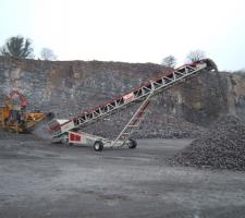 Mobile conveyor in use on quarry site 