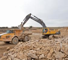 A Volvo A40D dump truck being loaded 