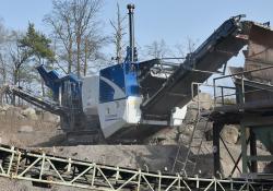 The Kleemann MOBICAT MC 110(i) EVO2 jaw crusher in operation at the quarry