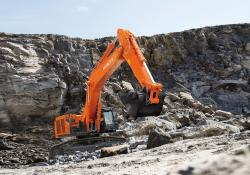 A Hitachi ZX690-7 crawler excavator at work in a quarry