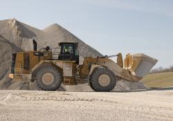 A Cat 988K wheeled loader at work on a MENA quarrying site