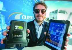 Outset's Luca Toneatti with the company’s new T1 weighing device for vehicle payloads