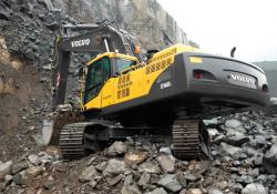 Volvo excavators digging in rocks