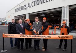 Ritchie Bros cutting the ribbon at the opening of their German centre