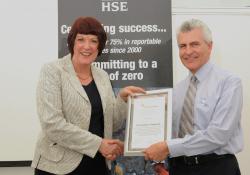 Martin Isles receives a signed "recommitment to Target Zero" certificate
