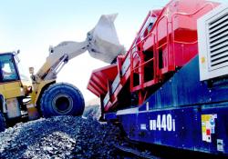 Loading aggregates into a crusher