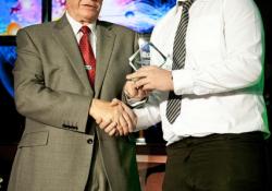 Cori McArdle receives his award at the TDR Training Annual Awards 2012