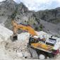 A Hyundai HX520L excavator working at the Colonnata marble quarry in Tuscany